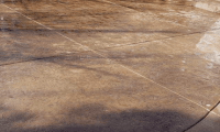 Stamped concrete patio showcasing modern design trends in Colorado, featuring a durable and stylish surface with earthy tones.