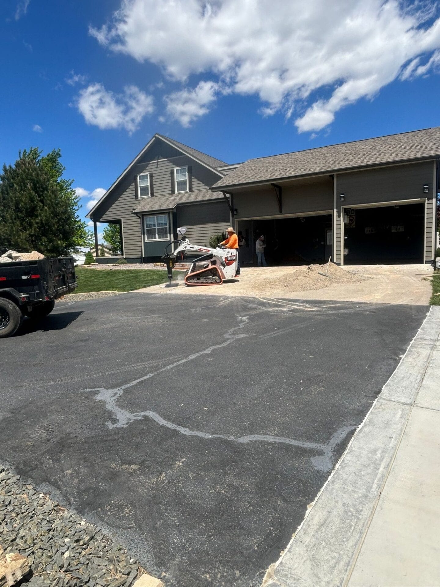 “Old driveway with steel mesh before replacement in Berthoud, CO”