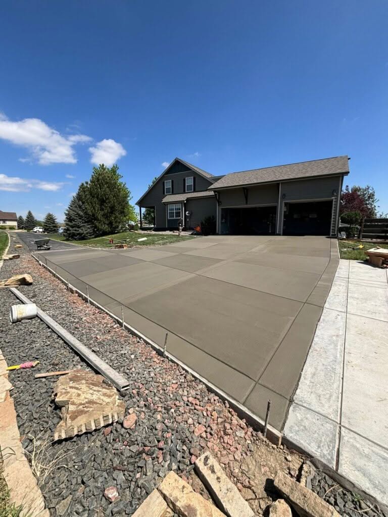 New large concrete driveway replacement completed in Berthoud, Colorado, including full removal and upgraded reinforcement