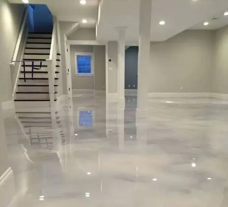 High-gloss epoxy flooring installed in Loveland CO by Hugo’s Concrete,