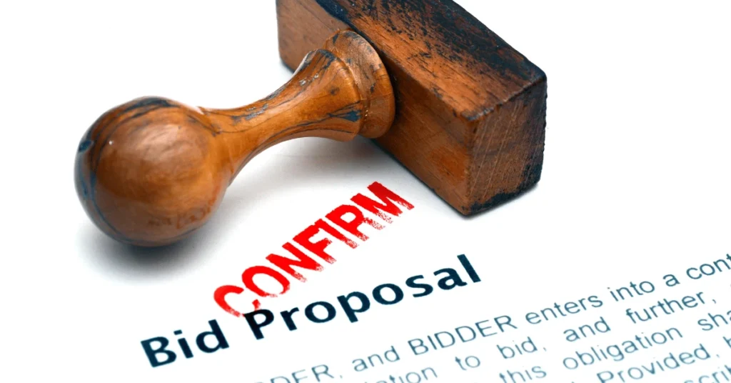 Bid proposal document stamped 'confirm' representing the importance of reviewing concrete contractor bids closely
